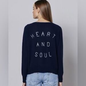 360 cashmere sweater with “heart and soul” on the back